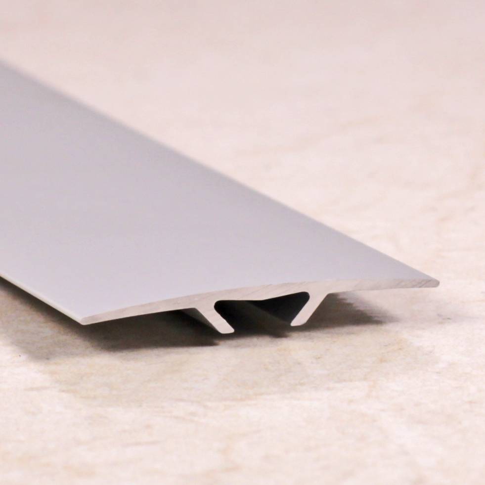 Стыковочные порожки для пола: разноуровневый алюминиевый, гибкий порог между ламинатом и плиткой